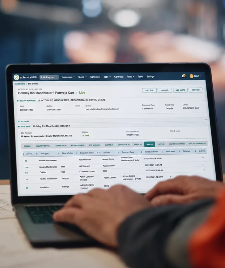 Customer, site and job history on a laptop
